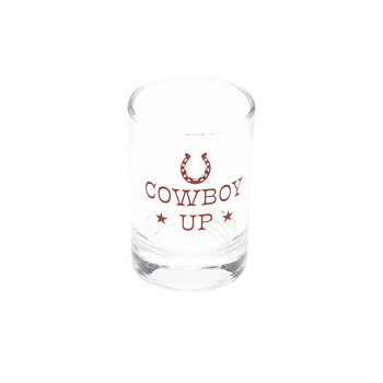 Angled top view of clear Cowboy Up shot glass with rust-red western artwork.