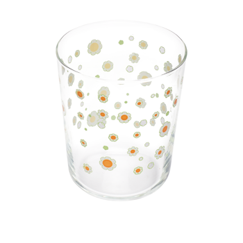 Angled top view of clear rocks glass with delicate green and orange daisy pattern.