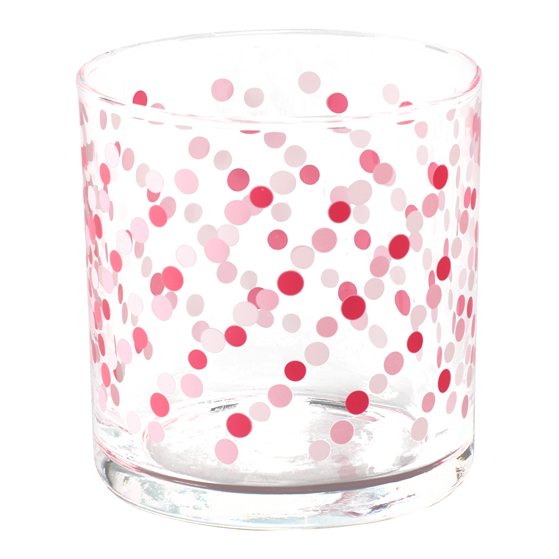 Clear glass tumbler with pink and red polka dot pattern on a white background
