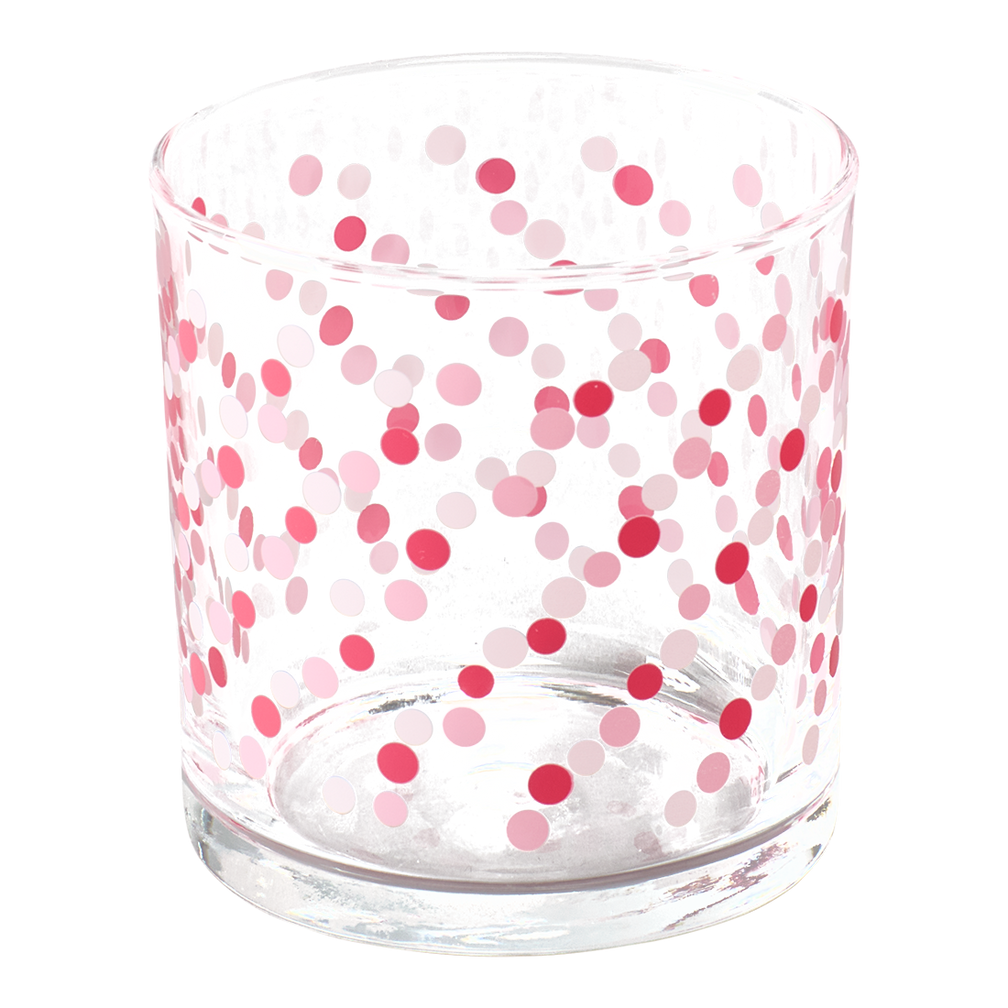 Clear glass with pink and red polka dot pattern on a white background