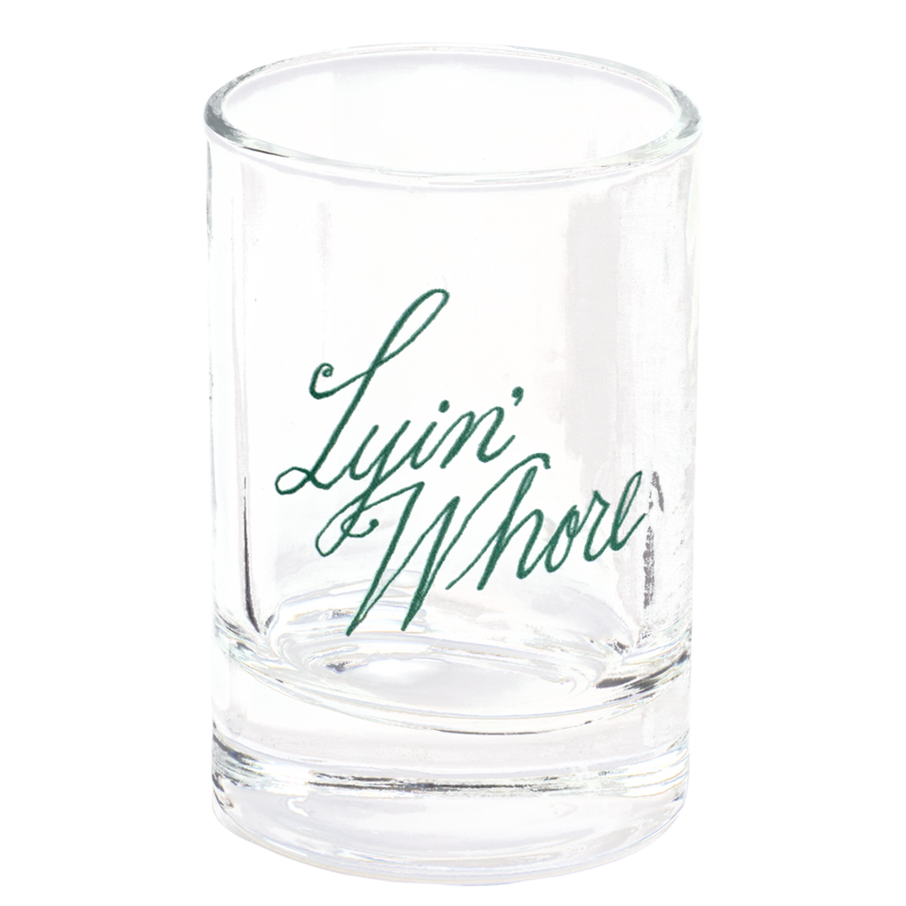 Pleasantries Lyin Whore Shot Glass with humorous graphic design, perfect for enhancing your table setting