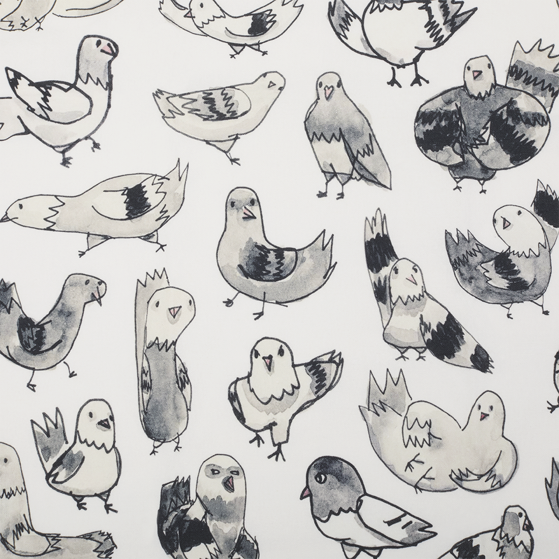 Close up of a white tea towel covered in whimsical gray and black hand-drawn NYC pigeon