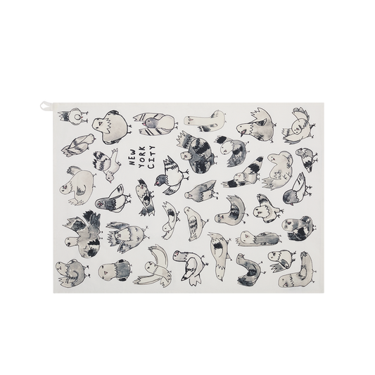 Full view of the NYC Pigeons tea towel with scattered pigeon illustrations and “New York City” text