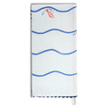 Pale blue fish and waves tea towel laid flat vertically, showing repeated blue wave lines with small orange fish jumping between them and dark blue scalloped border trim.