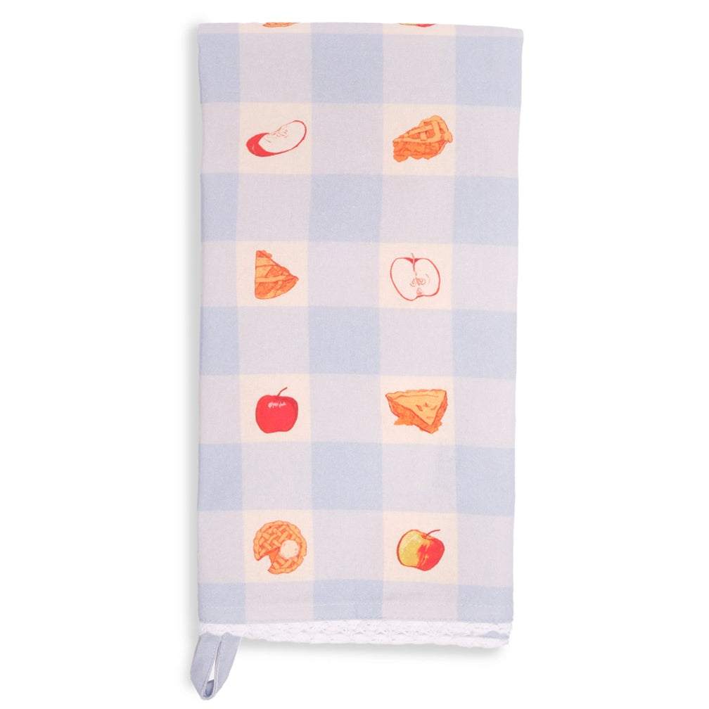 Light blue and white gingham tea towel folded lengthwise and shown vertically, featuring small red apples and golden apple pie illustrations in alternating checks, with white lace trim.