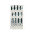 Folded cream tea towel with rows of teal suspension bridge illustrations