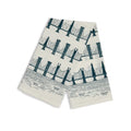 Cream bridge and tunnel tea towel draped open showing the teal bridge pattern