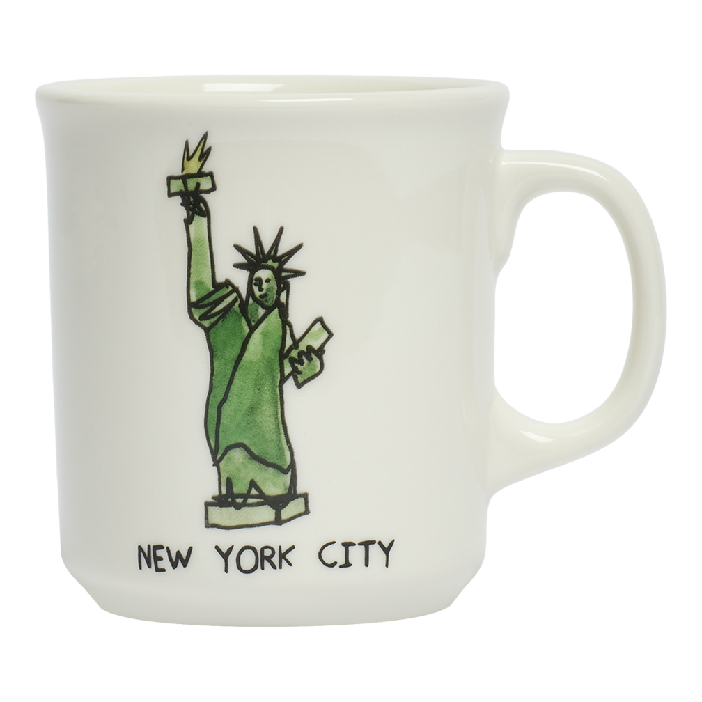 White mug with a green Statue of Liberty illustration and 'New York City' text on a white background