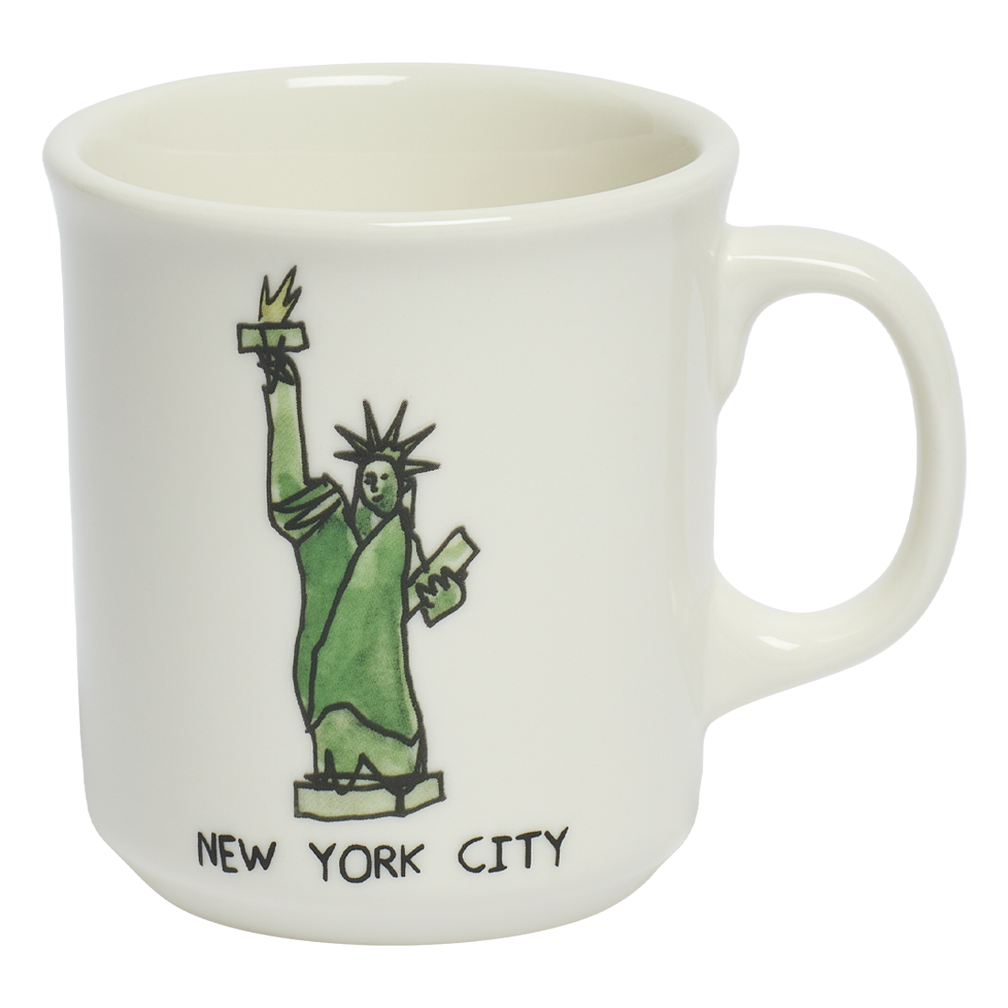White mug with a green Statue of Liberty illustration and 'New York City' text on a white background