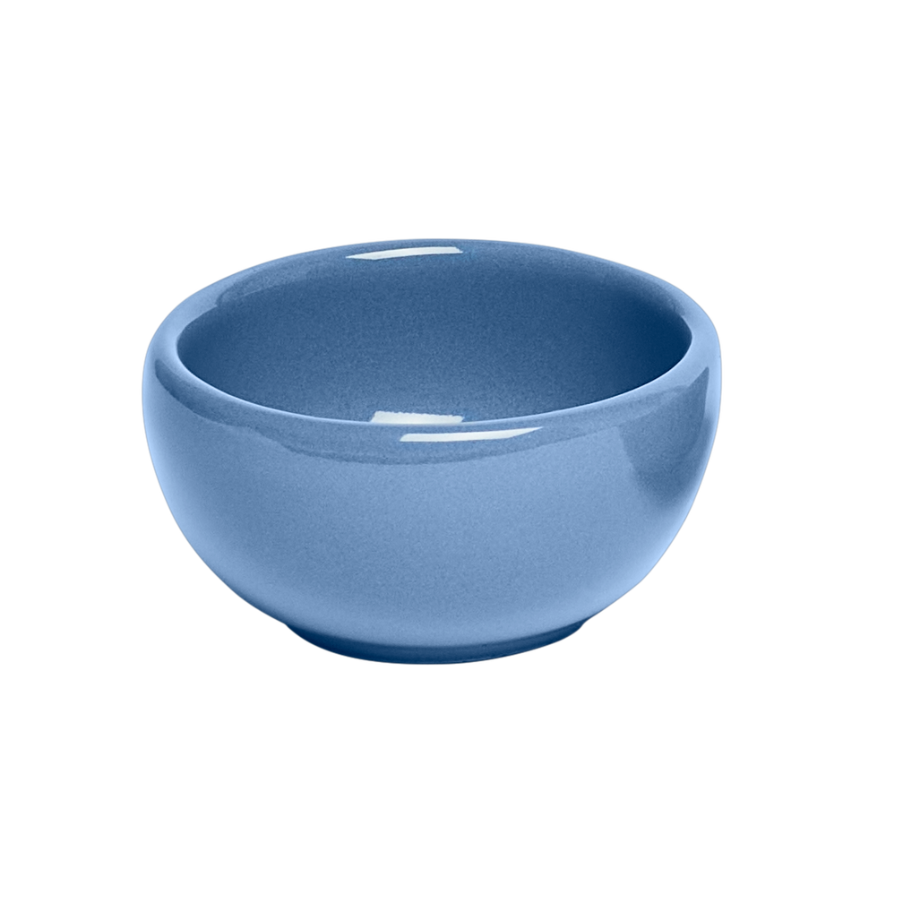 Blue ceramic bowl on a white background