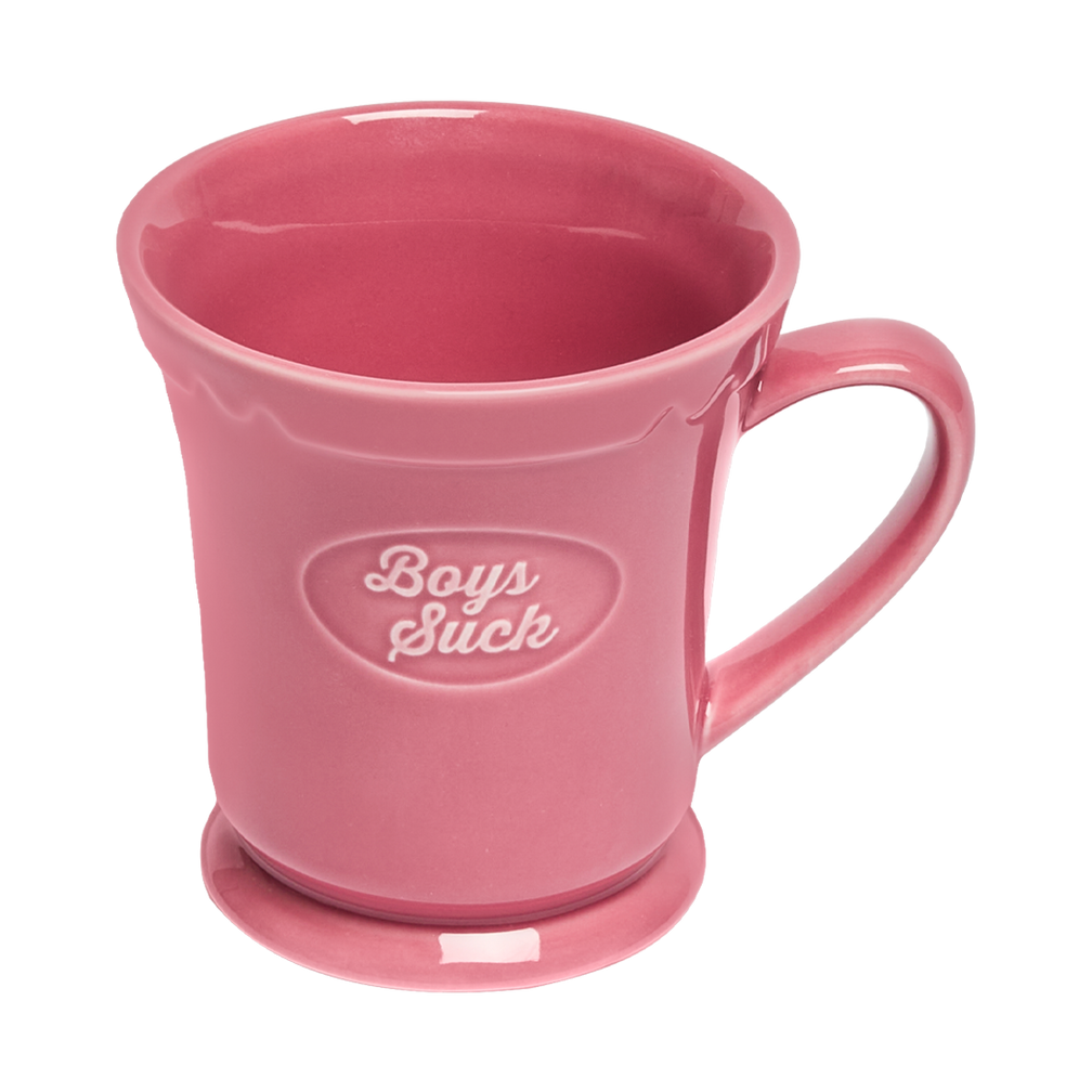 Pink mug with 'Boys Suck' text on a white background