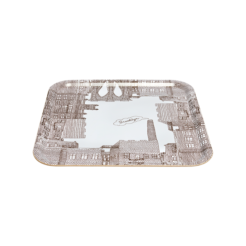 Decorative tray with cityscape design on a white background