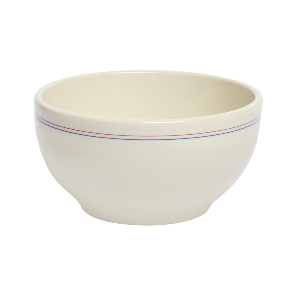 Beige ceramic bowl with colorful stripes on a white background