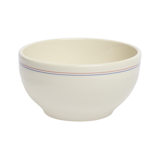 Beige ceramic bowl with colorful stripes on a white background