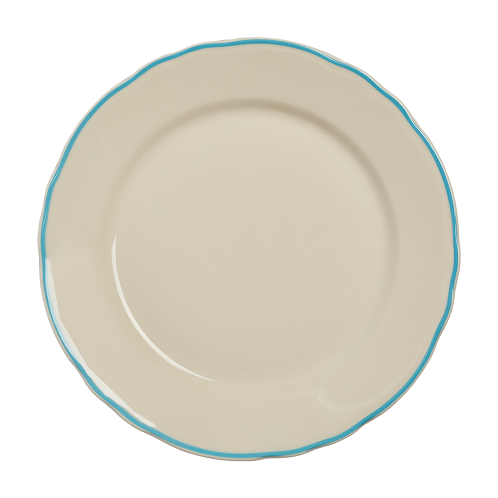 Beige ceramic plate with a blue rim on a white background