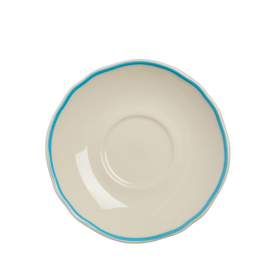 Ceramic bowl with blue rim on a white background