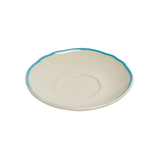 White ceramic plate with a blue rim on a white background