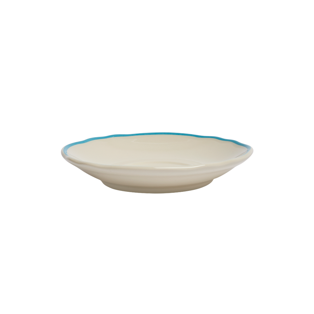 White ceramic bowl with blue rim on a white background