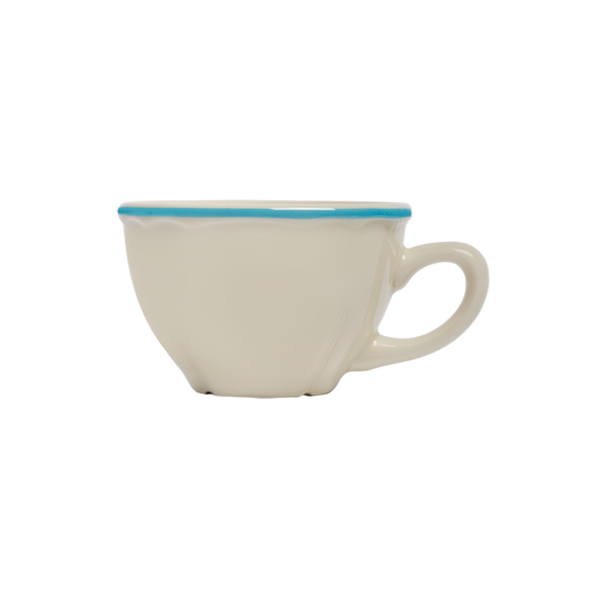 White ceramic cup with a blue rim on a white background