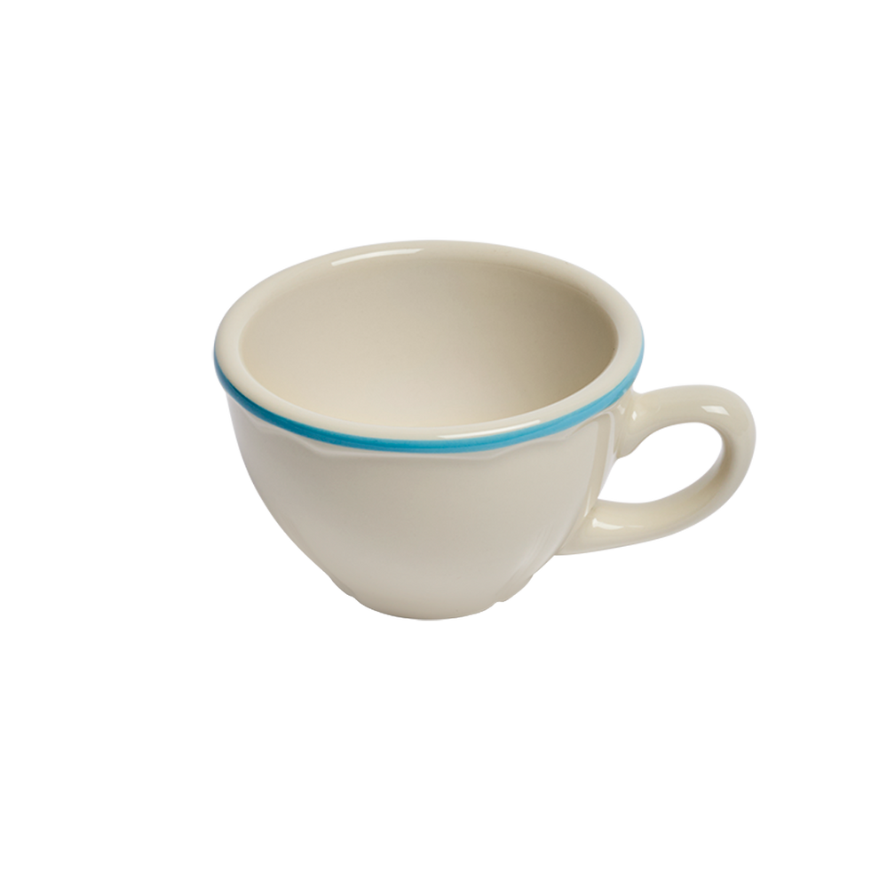 White ceramic cup with a blue rim on a white background