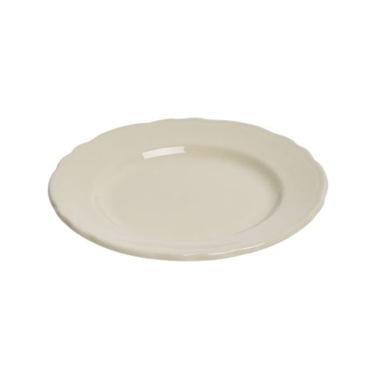 Beige ceramic plate on a white background