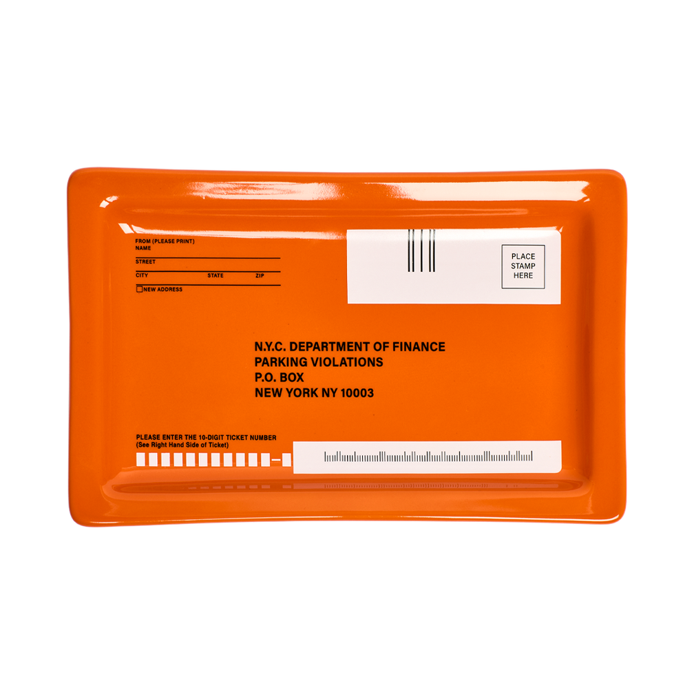 Orange tray with printed text and labels on a white background