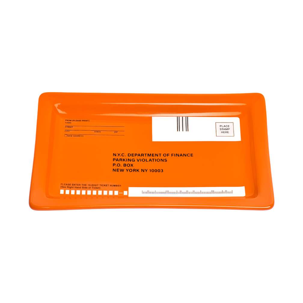 Orange envelope with text and a barcode on a white background