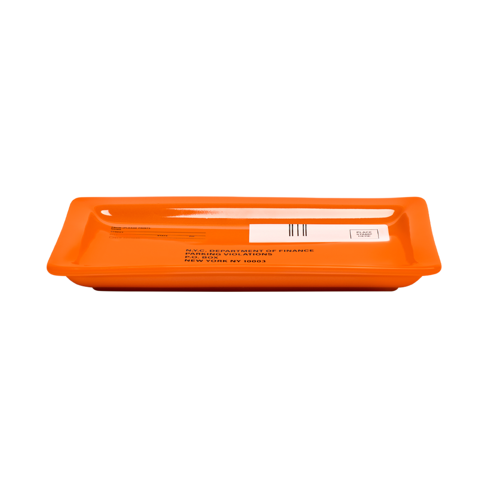 Orange rectangular plastic container with a label on a white background