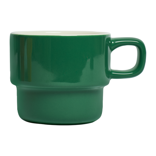 Green ceramic mug on a white background