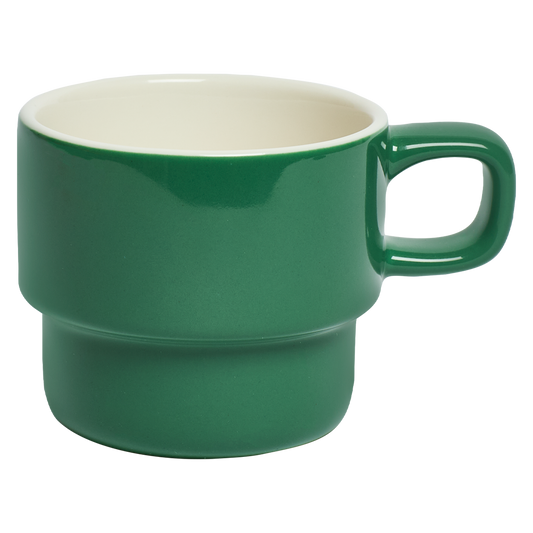 Green ceramic mug with a white interior on a white background
