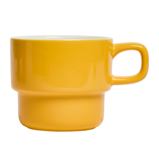 Yellow mug on a white background