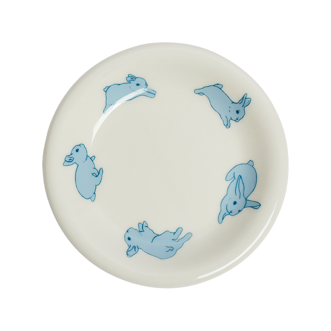 White plate with blue rabbit illustrations on a white background