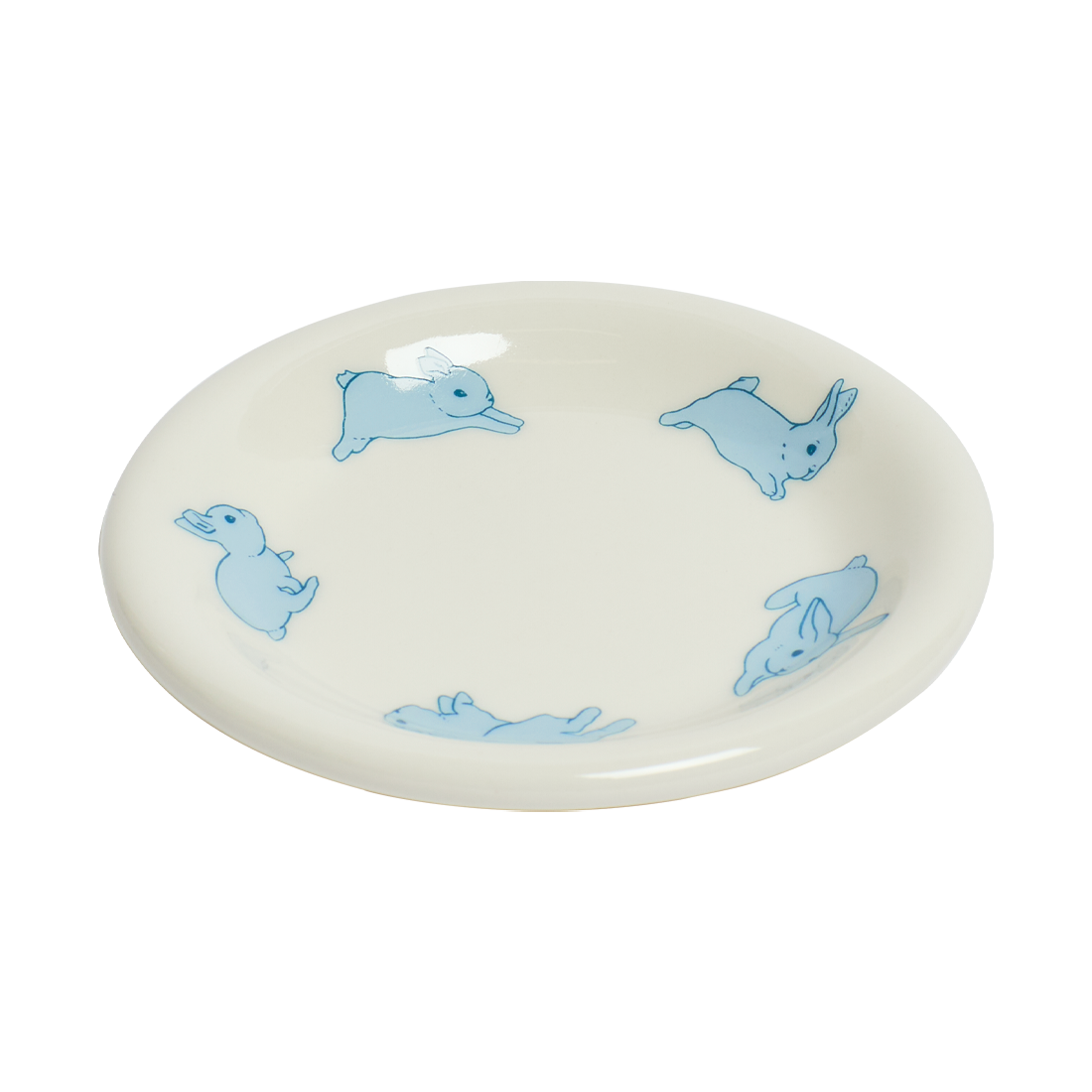 Round ceramic plate with blue rabbit illustrations on a white background