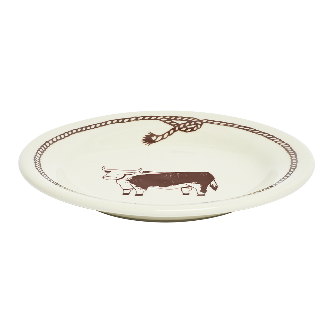 Round ceramic plate with a cow design on a white background