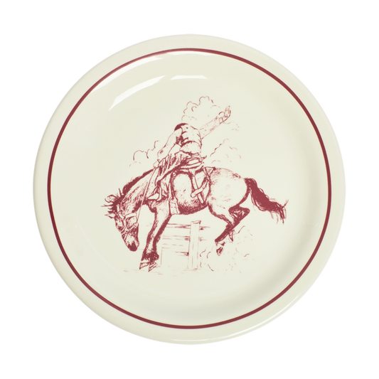 Ceramic plate with a red border and graphic of a person on horseback on a white background