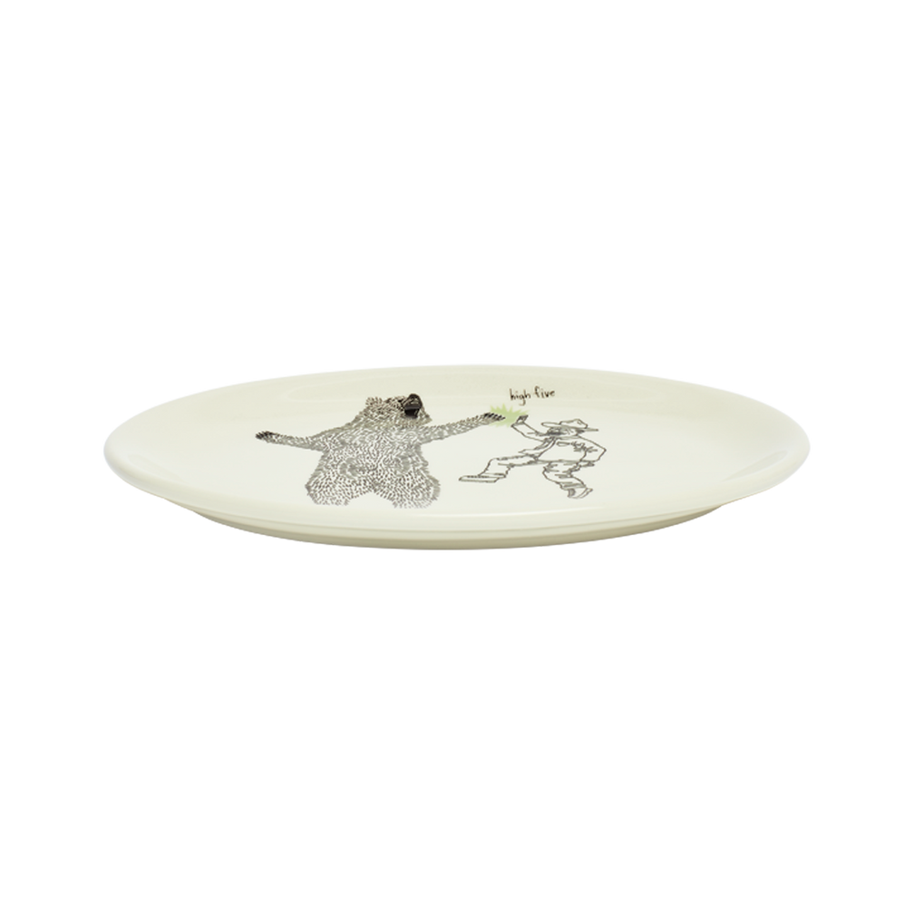 Decorative plate with artistic designs on a white background