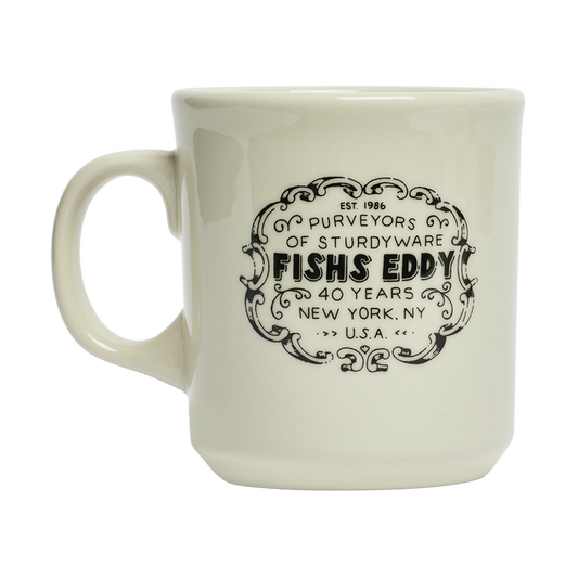 White mug with black text and branding on a white background