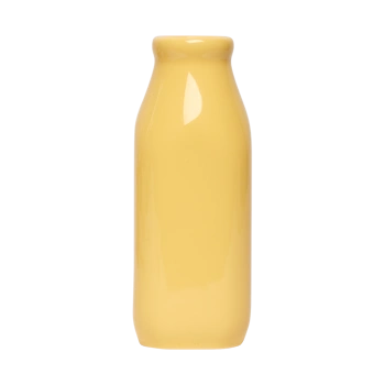 Front view of a tall yellow ceramic milk jug with vintage bottle styling, suited for casual serving, countertop display, or small flower arrangements.