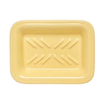 Top view of a yellow ceramic soap dish with a shallow rectangular form and raised details that help keep bar soap tidy beside the sink.