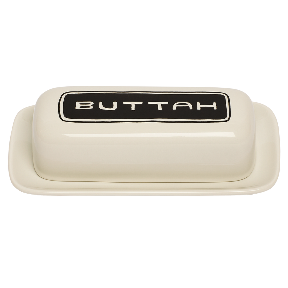 Beige butter dish with 'BUTTAH' label on a white background