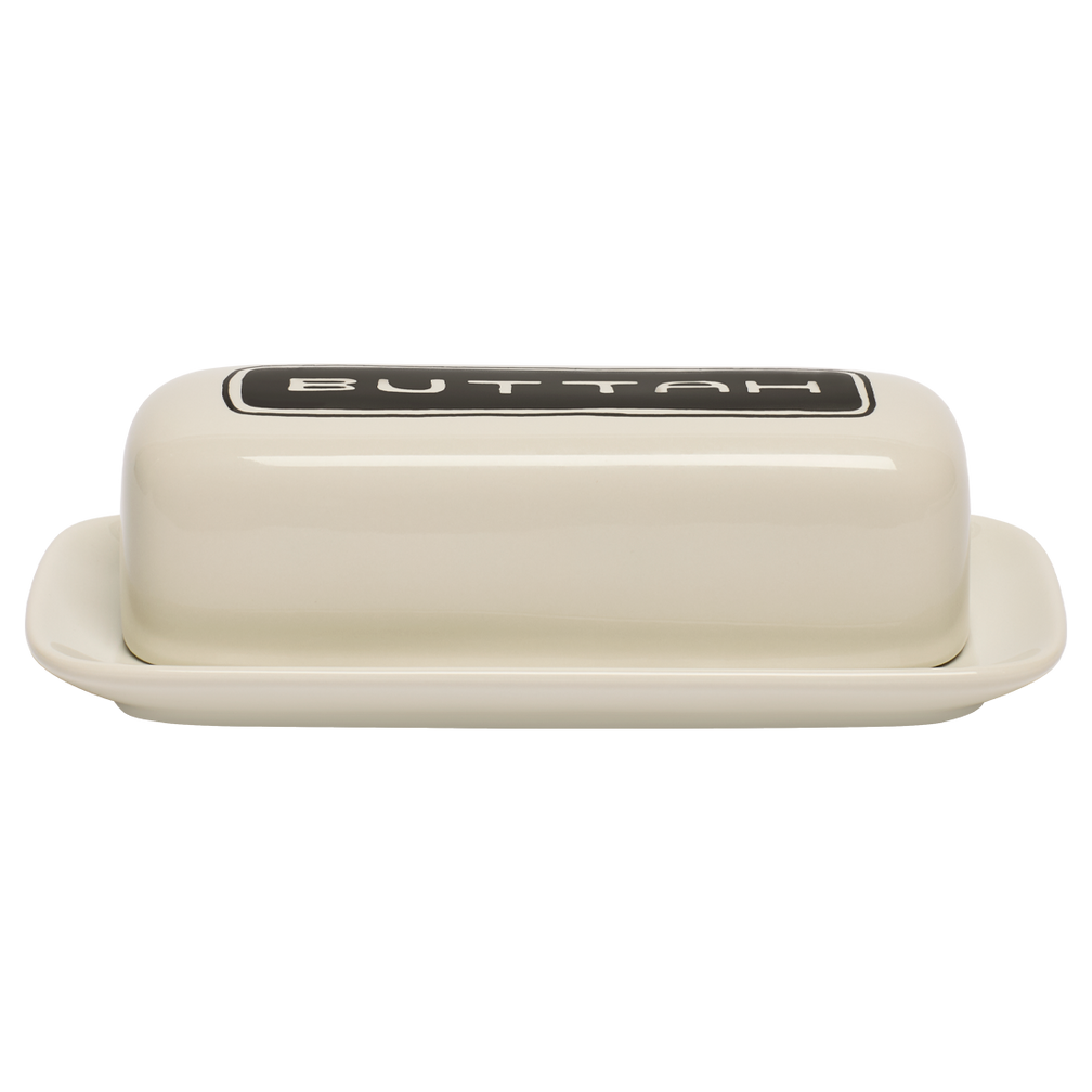 Cream-colored butter dish with 'BUTTAH' label on a white background