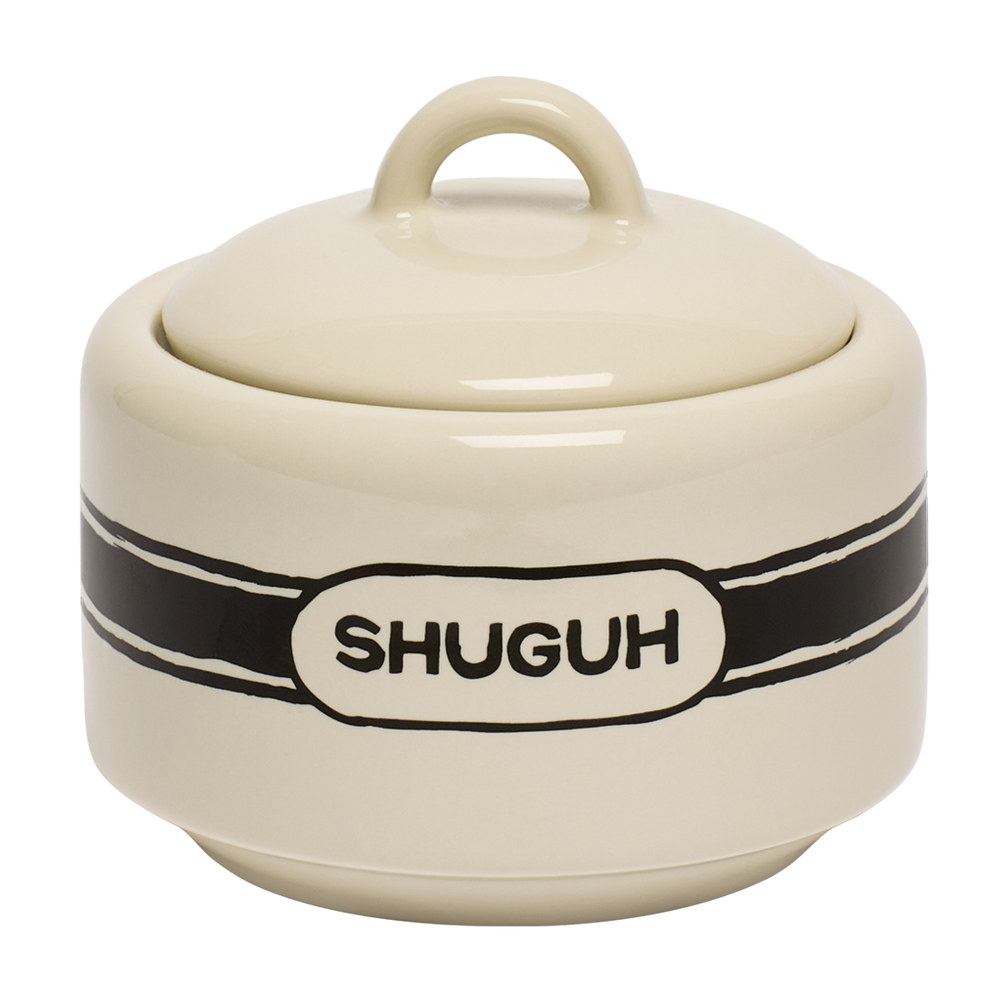 Beige ceramic jar with a black band and 'SHUGUH' branding on a white background