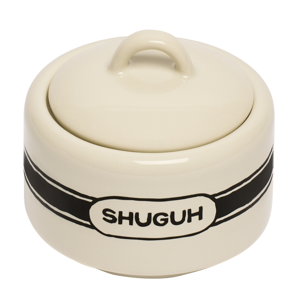 Cream-colored ceramic container with a lid and 'SHUGUH' branding on a white background
