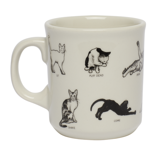 White mug with black illustrations of cats and text on a white background