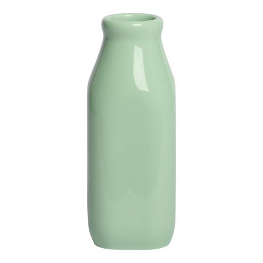 Green ceramic bottle on a white background