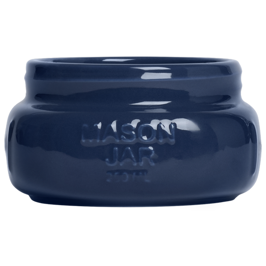 Blue ceramic jar with 'MASON JAR' text on a white background
