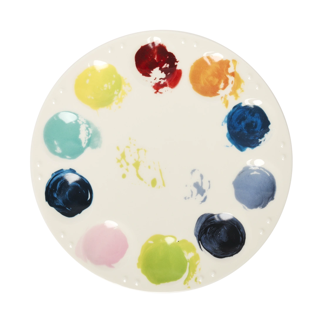 Round ceramic artist palette plate featuring colorful paint dabs arranged around the rim, inspired by a painter’s mixing palette. Decorative serving plate for snacks, appetizers, desserts, and creative entertaining. Top view.