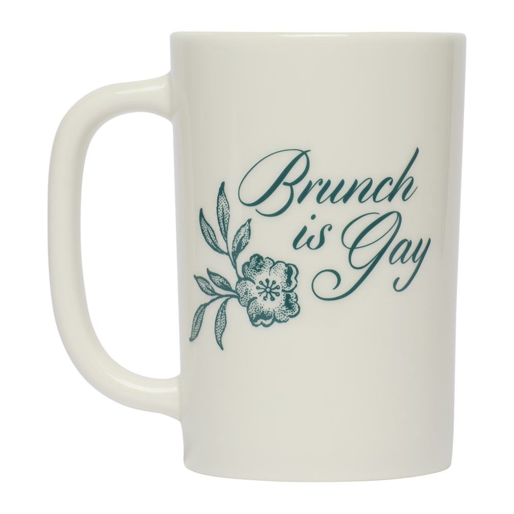 White mug with 'Brunch is Gay' text and floral design on a white background
